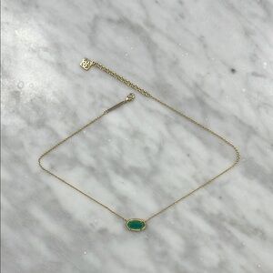 Elegant Gold Necklace with Green Pendant